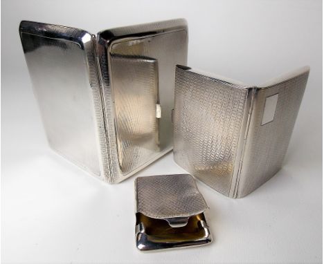 George V silver engine turned cigarette case, Birmingham 1925; together with another silver engine turned cigarette case and 