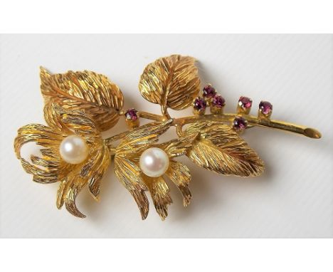 Attractive post-war 18ct gold pearl and ruby set open work floral brooch, the textured flowers and leaves set with two pearls