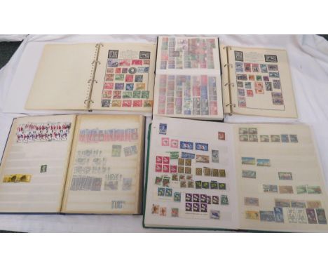 Two white stamp albums containing early British Commonwealth stamps including Victorian and later Universal Postal Union stam