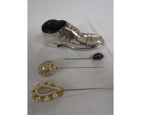 Silver clad pin cushion modelled as a man's shoe, length 12.5cm, marks for Chester, 1912, S Blanckensee &amp; Son Ltd, Regd 5