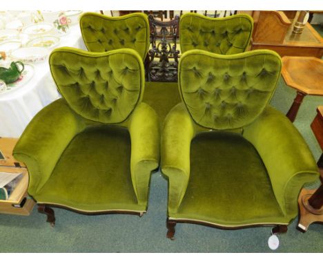 Edwardian salon suite comprising a two-seater settee with a pierced ebonised central panel, and two armchairs, heart-shape ba