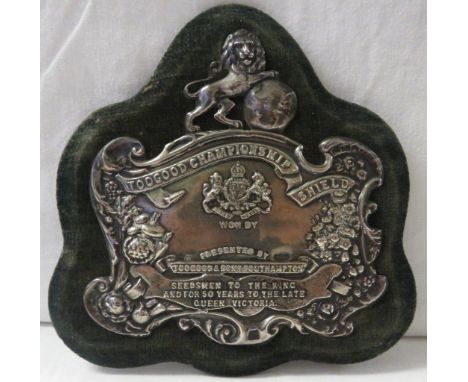 A George V repousse silver competition shield embossed 'TOOGOOD CHAMPIONSHIP SHIELD WON BY [BLANK] PRESENTED BY TOOGOOD &amp;