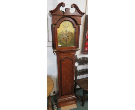 An early 19th century oak cased eight day chiming Grandfather clock by Robert Clidsdale of Edinburgh. The brass dial has a Ro