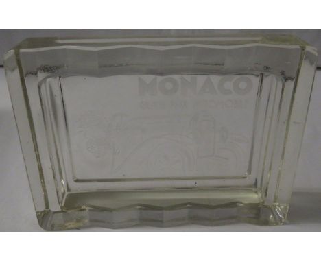 Monaco Grand Prix Automobile glass ashtray, rectangular, etched to the reverse with title and image of woman driving racing c
