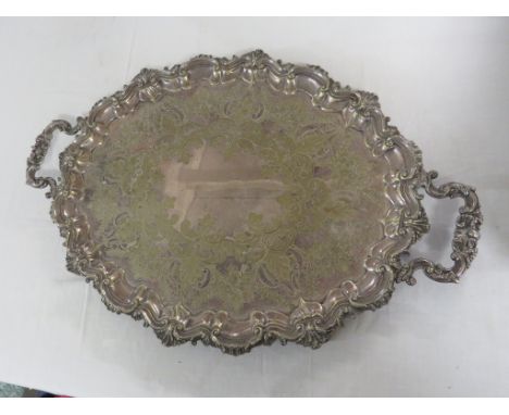 Large silver plated oval tray, scrolled border with foliate engraving, two handles, base marked 'EPNS Made in England', lengt