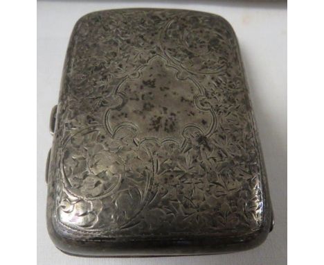 Silver cigarette case, foliate chasing, marks for Birmingham, 1910, maker's stamp S.M.L, 1.8 ozt