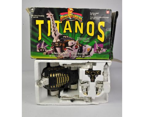Power Rangers Titanos BOXED Bandai 1993This lot features Titanos! the ultimate companion to the Megazord. This item comes box