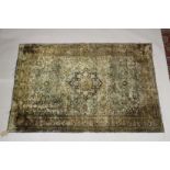 A PERSIAN STYLE RUG, turquoise ground with all stylised floral decoration. 6ft 8ins x 4ft 5ins.