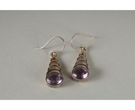 A PAIR OF SILVER AND AMETHYST EARRINGS.