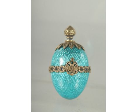 A VERY GOOD RUSSIAN SILVER AND ENAMEL EGG PENDANT. Possibly Faberge.  5cm.