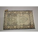 A SMALL PERSIAN PART SILK PRAYER RUG (WORN). 3ft 1ins x 2ft .