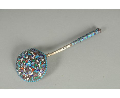 A RUSSIAN SILVER AND ENAMEL SPOON, 18cm long. Mark: M R.   Weighs: 60gms.