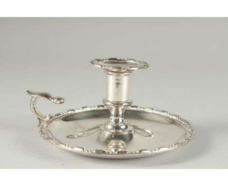 AN OLD SHEFFIELD PLATE CIRCULAR CHAMBER CANDLESTICK. 6ins high. 