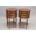 A GOOD PAIR OF LOUIS XVITH STYLE INLAID THREE DRAWER OVAL BEDSIDE CABINETS. 2ft 3ins high, 1ft