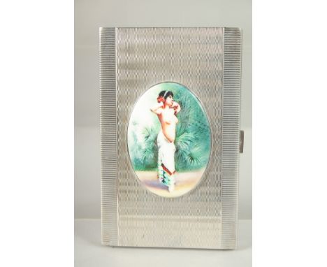 AN ENGINE TURNED SILVER CIGARETTE CASE. .800, with a glamour model.