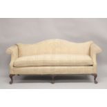 A LARGE CAMEL BACKED SOFA with padded loose cushions. 6ft 3ins long.