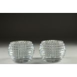 A SMALL PAIR OF BACCARAT CIRCULAR NIGHT LIGHTS. 3.5ins diameter, 2.5ins high. Signed in original