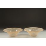 A PAIR OF COLOURED CIRCULAR LALIQUE BOWLS. Signed Lalique, France. 5.5ins deep.