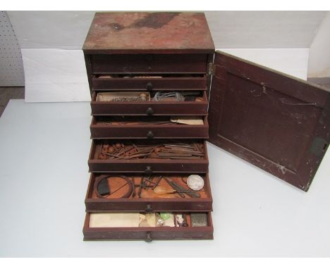 An engineers chests with contents including horological tools 