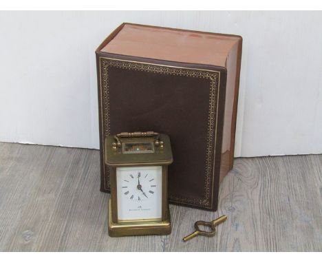 A 20th Century Matthew Norman brass carriage clock, boxed with key, 11cm high excluding handle 