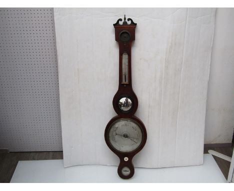 A George III mahogany five dial 8" wheel barometer (top glass missing) with silvered dial and thermometer plate, bottom dial 