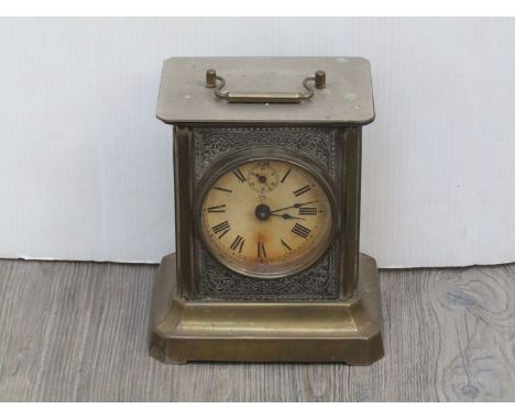A Junghans brass cased carriage clock with alarm mechanism 