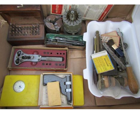 A collection of mixed horology tools including case opener, glass press, pin vices, taps and dies, centre punches etc 