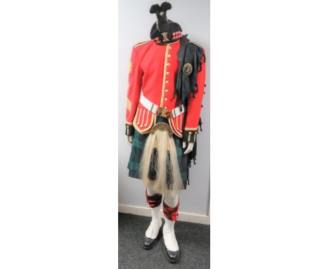 Current Scottish Bandsman Full Uniform consisting scarlet, Royal Highland Fusiliers doublet. Black faced, high collar, cuffs 