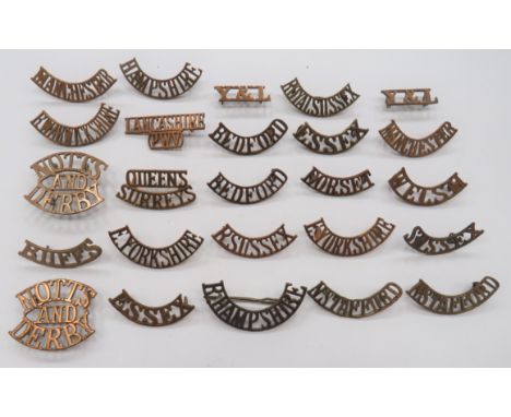 Brass Infantry Shoulder Titles including Y &amp; L ... Bedford ... Manchester ... N Stafford ... E Yorkshire ... Hampshire ..