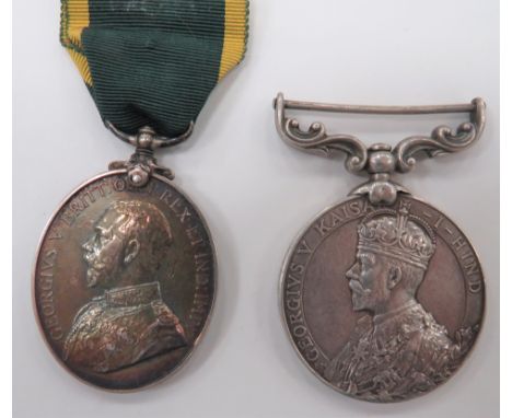 Territorial Force Efficiency Medal King George V example named "393 Sjt. W Crane 4/N MID (H) B. RFA". Together with a King Ge