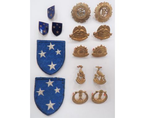 Irish Army Cap and Collar Badges consisting 2 x brass Army cap badges ... 2 x brass Engineers collars ... 2 x brass Signal Co