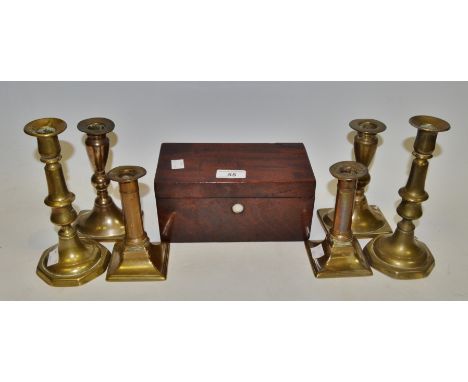 A George III mahogany two section tea caddy, mother of pearl escutcheon (faults); a pair of Georgian brass candlesticks, othe