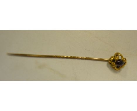 A Victorian cabouchon garnet stick pin c 1850