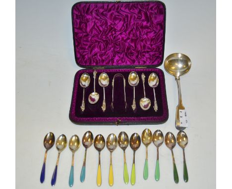 A set of Victorian silver Apostle spoons, London 1885, cased; a Fiddle pattern ladle;  etc 