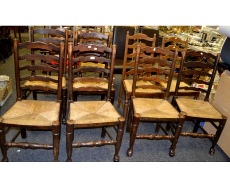 A set of six North Country oak ladder back rush seated chairs