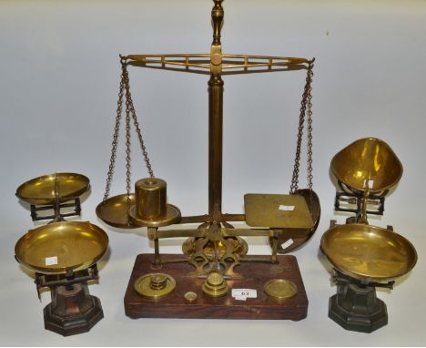 A W & T Avery weighing scale, another; a balance scale; postal scales, accompanied by weights (4)