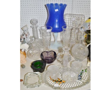 Glassware - an Edwardian globe and shaft decanter; others; a large clear and blue glass wine glass, coloured ashtrays; dressi