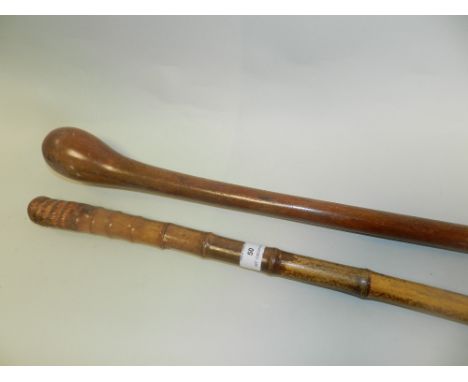 A German cane sword stick the blade marked Solingen together with a Pollard oak walking stick
