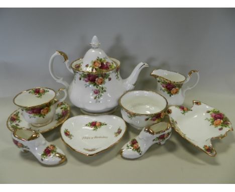 A Royal Albert Old Country Roses pattern tea set comprising six cups, six saucers, a milk jug, sugar bowl, teapot and cover, 