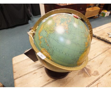 A Columbus globe, illuminated for table top display