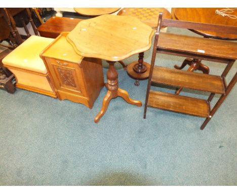 A Victorian walnut framed lift top foot stool on castors, a late Victorian walnut coal purdonium, a shaped top mahogany tripo