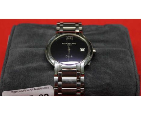 A Raymond Weil "Othello" purple faced wrist watch