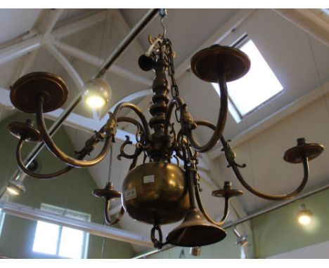 A vintage brass six sconce candelabra with fish head decals&nbsp;&nbsp;