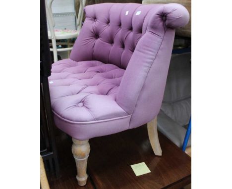 A lilac upholstered button back bedroom chair