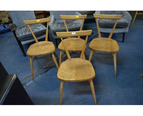 Four Ercol Light Oak Dining Chairs 