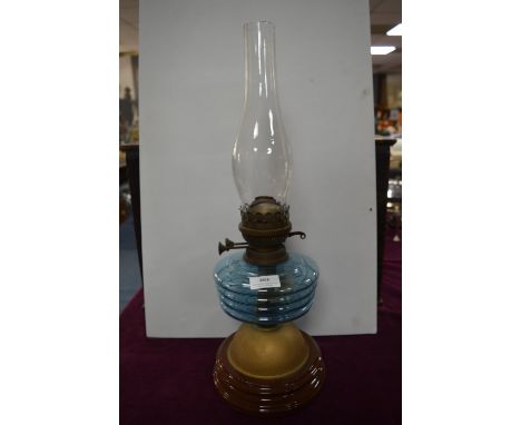 Victorian Oil Lamp with Ceramic Base and Blue Glass Reservoir