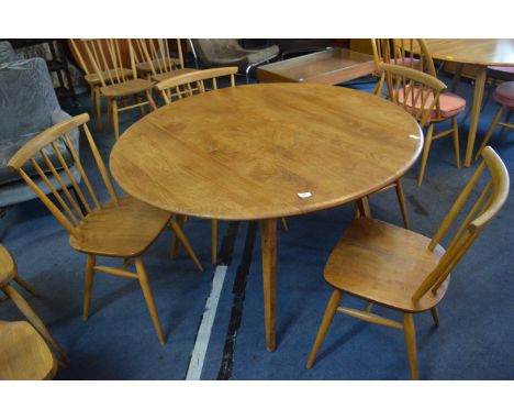 Ercol Oval Dining Table with Four Matching Chairs 