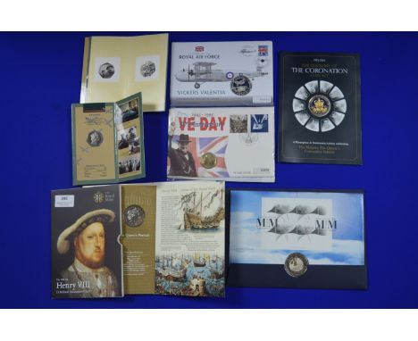 Seven Packs of Assorted UK Commemorative Coins, First Day Covers, etc. 