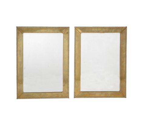 A pair of brass framed wall mirrors, mid 20th century, each 73cm high, 52cm wideCondition Report: Marks, knocks, scratches, a