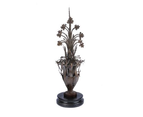 A wrought and sheet iron roof finial modelled as a flowering vase, second half 19th century, French or English, loosely in Go